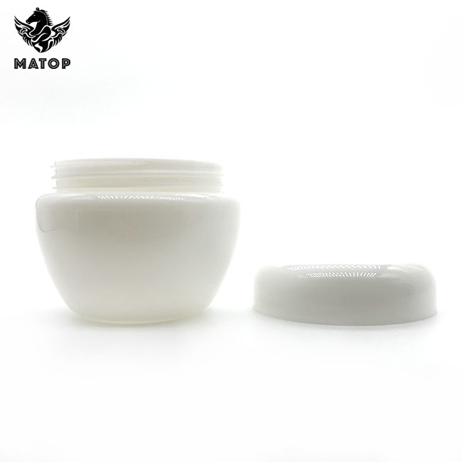 Round white plastic cosmetic jar with lid