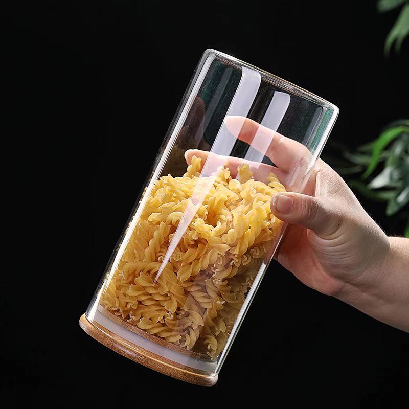 Safety for food 2021 hot sell borosilicate kitchen storage glass jar with bamboo and wood lid