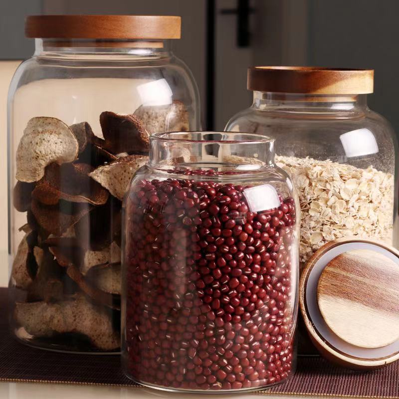 Safety for food 2021 hot sell borosilicate kitchen storage glass jar with bamboo and wood lid