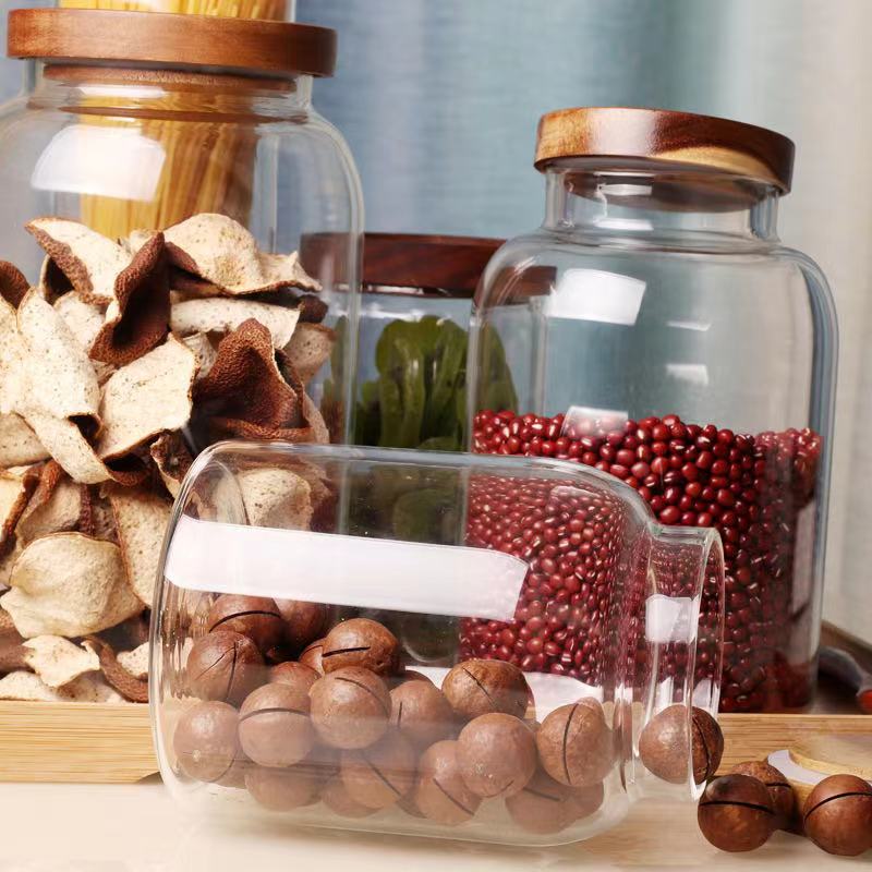 Safety for food 2021 hot sell borosilicate kitchen storage glass jar with bamboo and wood lid