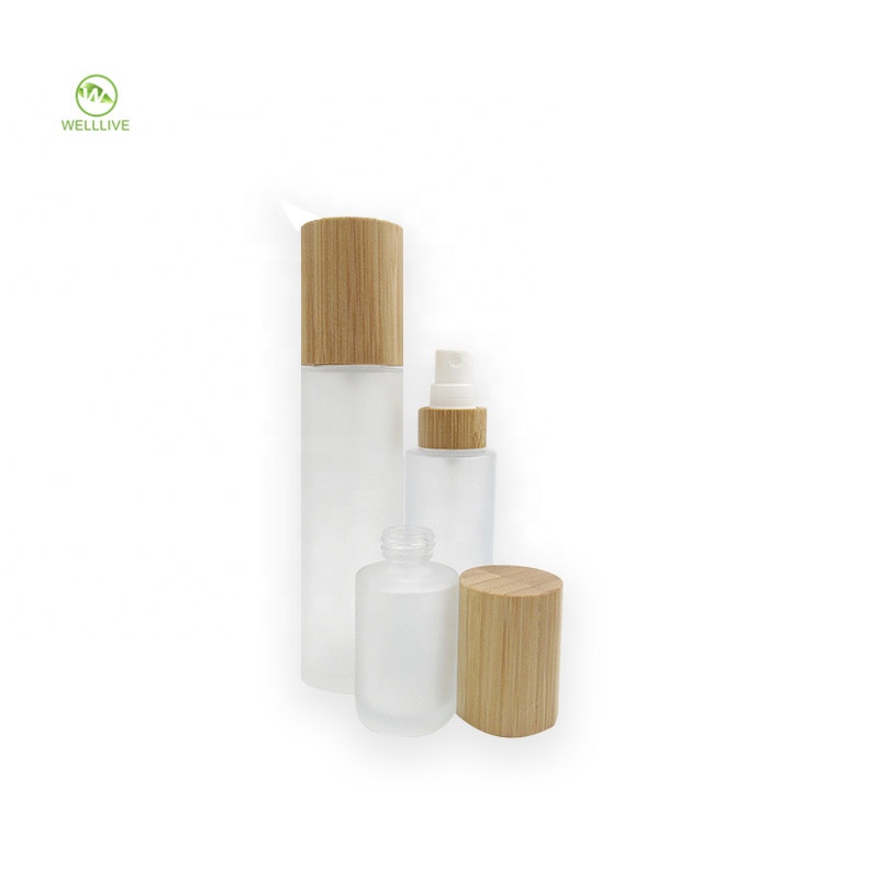 Screw top bamboo lid 50ml 60ml 2 oz frosted glass pump bottle for skincare