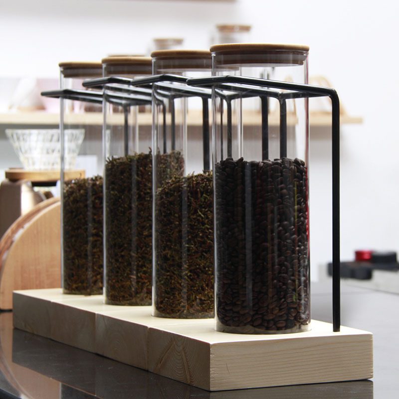 Shelves and wooden covers seal the glass storage tanks