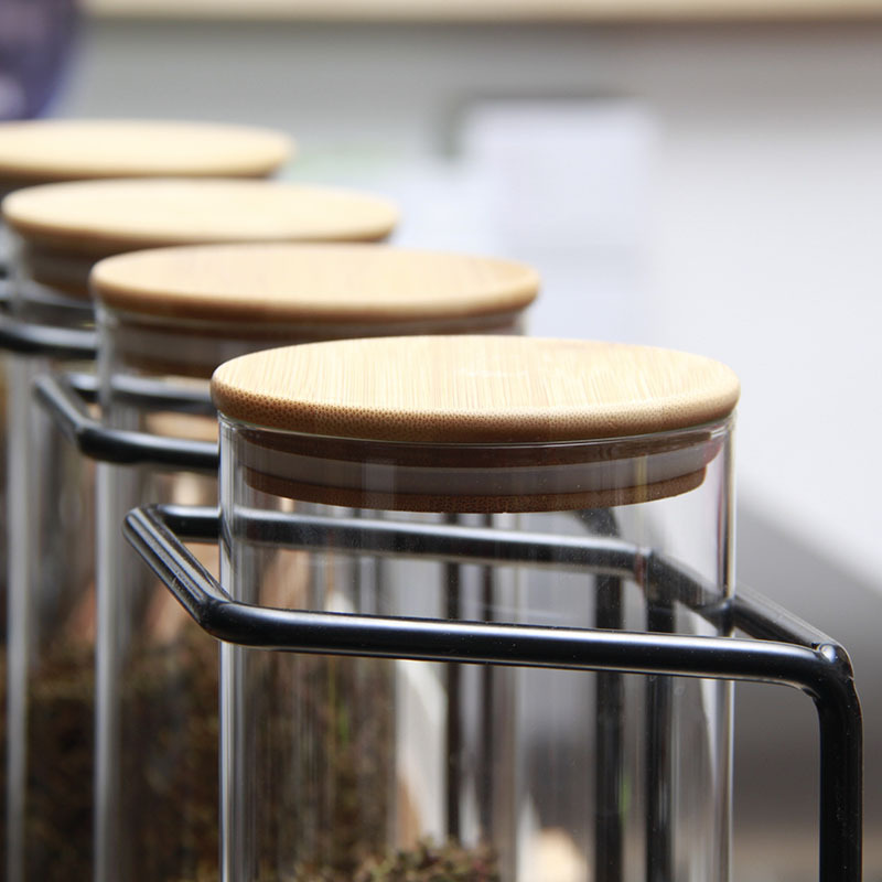 Shelves and wooden covers seal the glass storage tanks