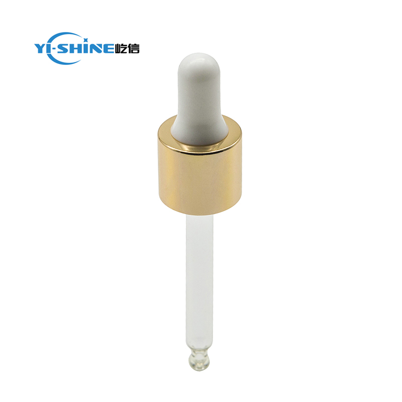 Shiny gold glass dropper pipette for essential oil bottle