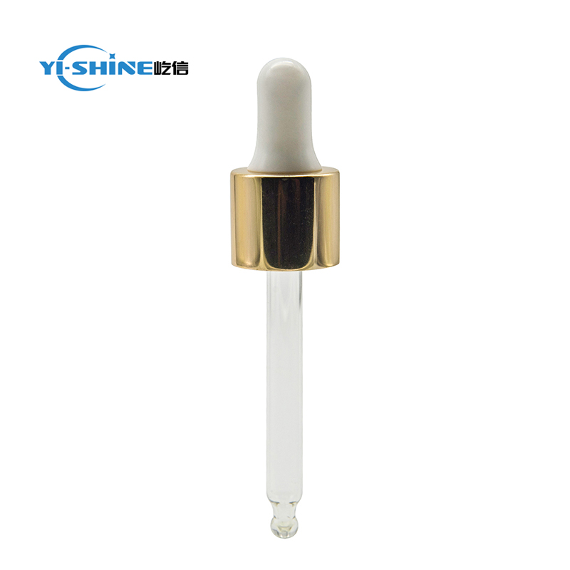 Shiny gold glass dropper pipette for essential oil bottle