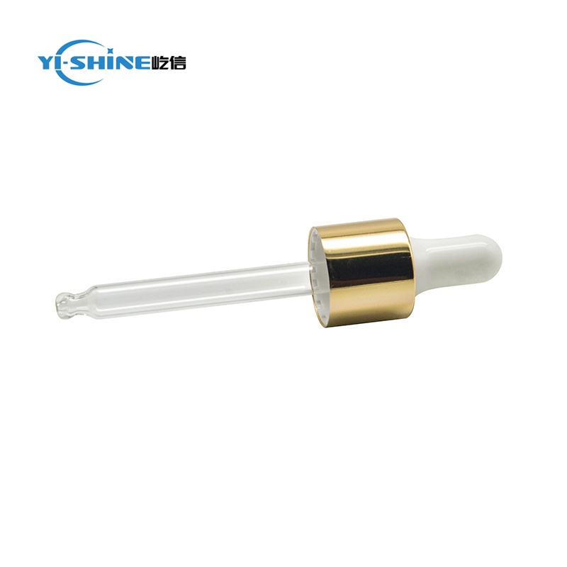 Shiny gold glass dropper pipette for essential oil bottle