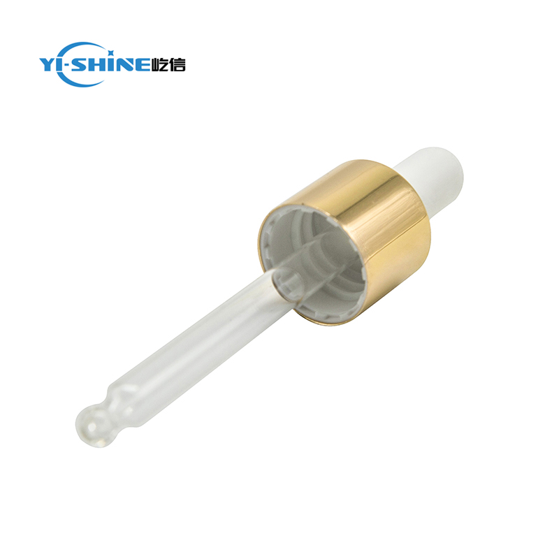 Shiny gold glass dropper pipette for essential oil bottle
