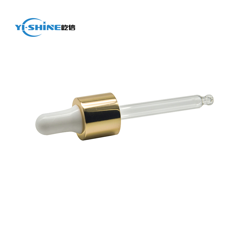 Shiny gold glass dropper pipette for essential oil bottle