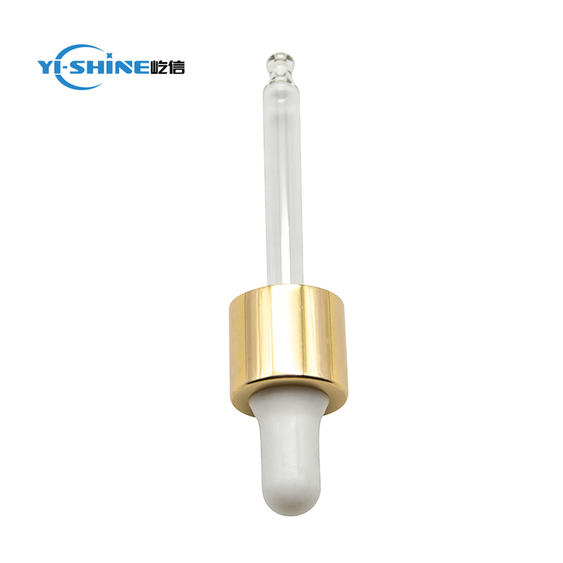 Shiny gold glass dropper pipette for essential oil bottle