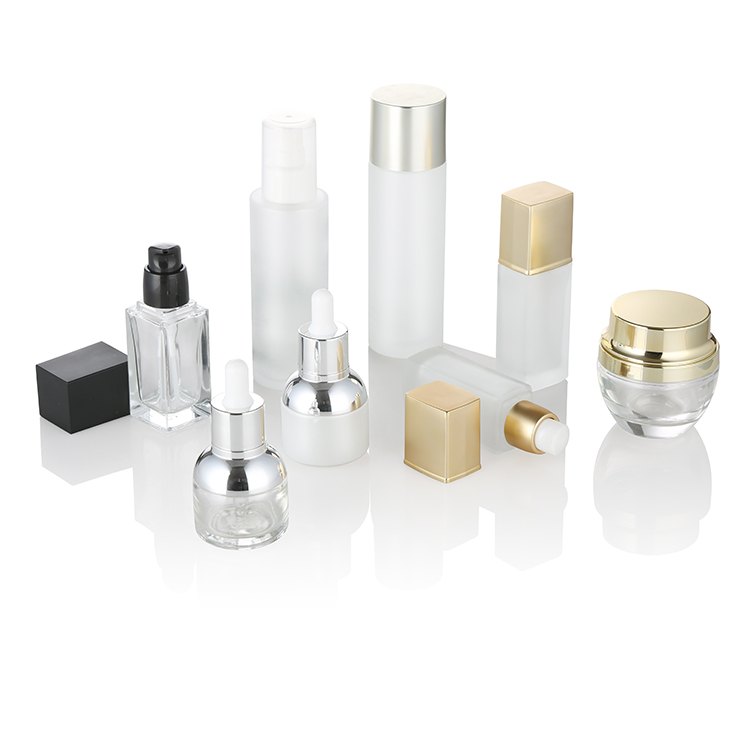 Shiny gold screw top clear 50ml 30ml 15ml empty round glass jar for cosmetic wholesale