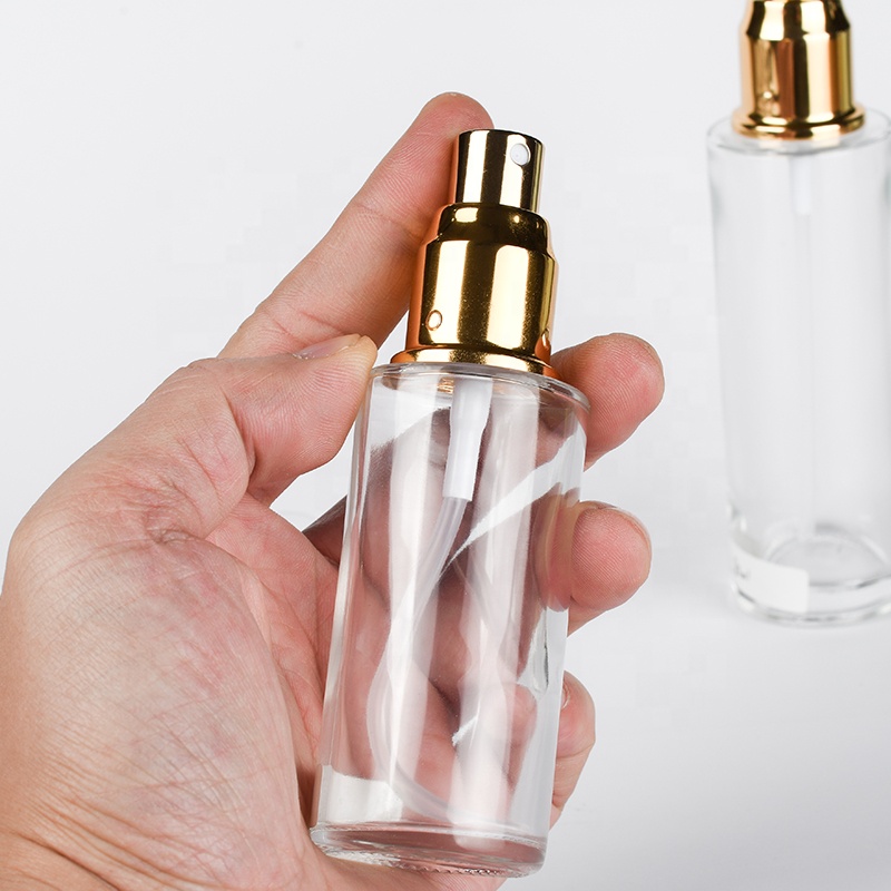 Skin care lotion toner 30ml 50ml 60ml 100ml 120ml flat shoulder frosted clear glass spray bottle with gold silver sprayer pump