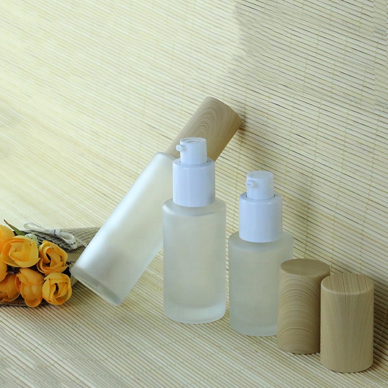 Skin care packaging 30ml 50ml 100ml flat round glass serum bottle with wood pump (EPG27)