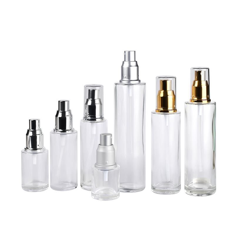 Skin care packaging 30ml 50ml  60ml 100ml 120ml clear frosted flat shoulder glass bottle with gold sliver aluminum sprayer cap