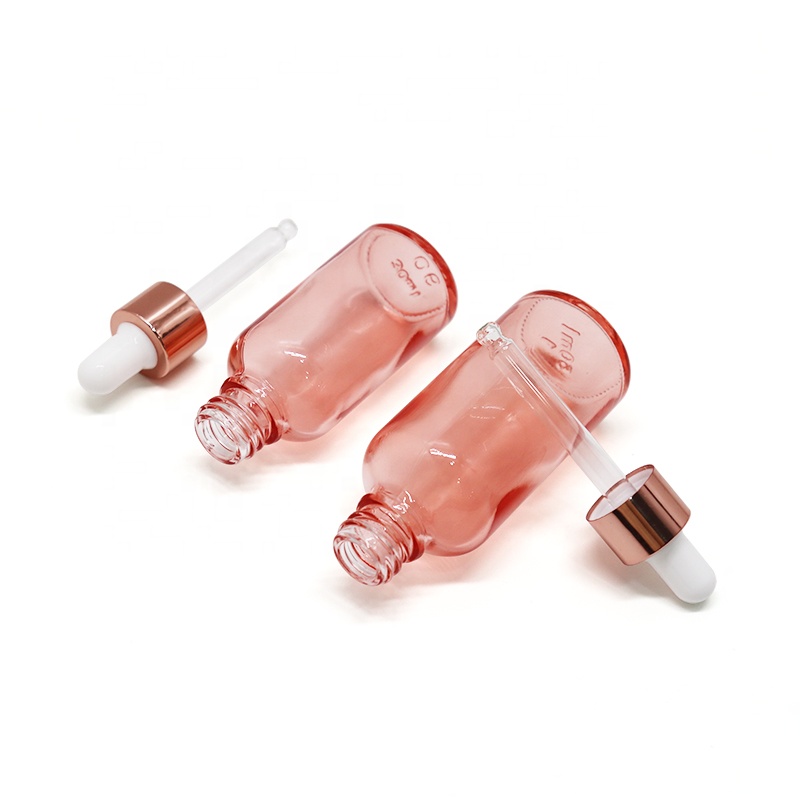 Skin care packaging 30ml 50ml round beautiful pink essential oil glass dropper bottle with rose gold screw lid