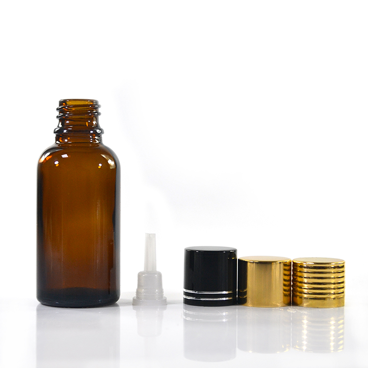 Skin care subpackage amber glass essential oil bottle cosmetic roll on perfume container and cream jars