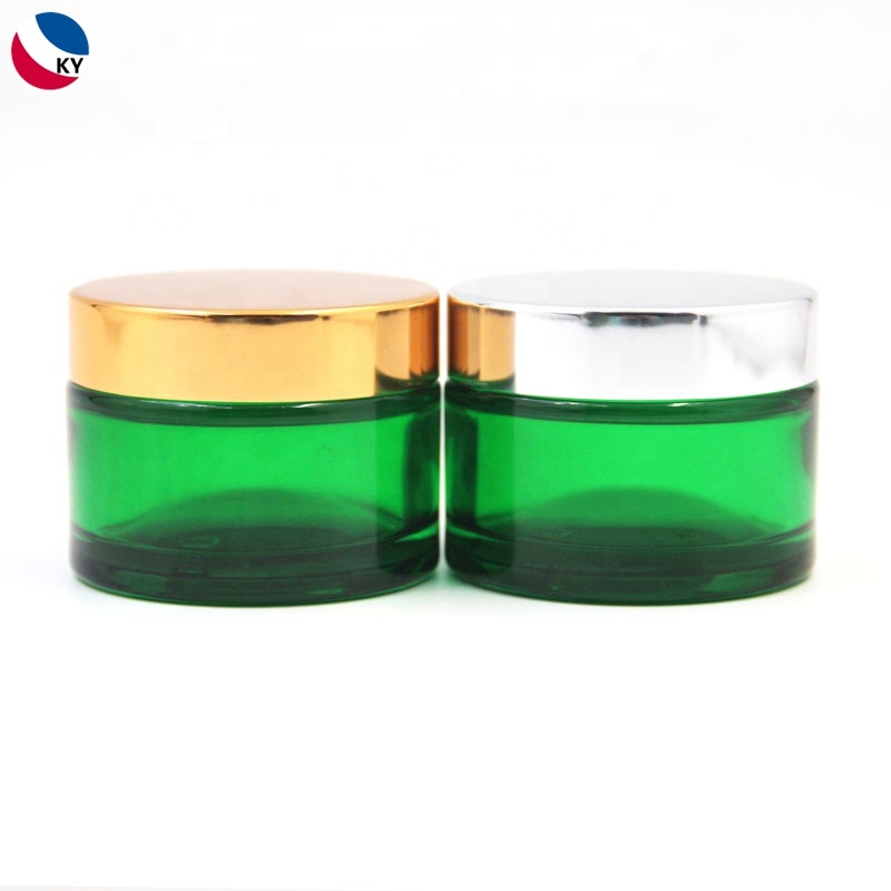 Skincare cream packaging gold coated green frosted glass cosmetic jar