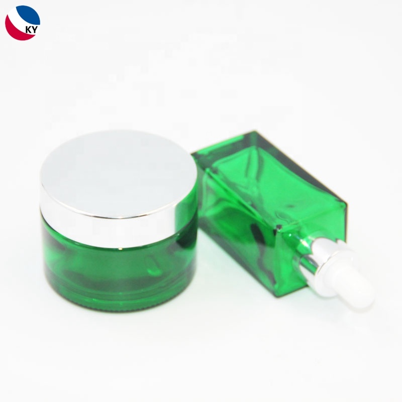 Skincare cream packaging gold coated green frosted glass cosmetic jar