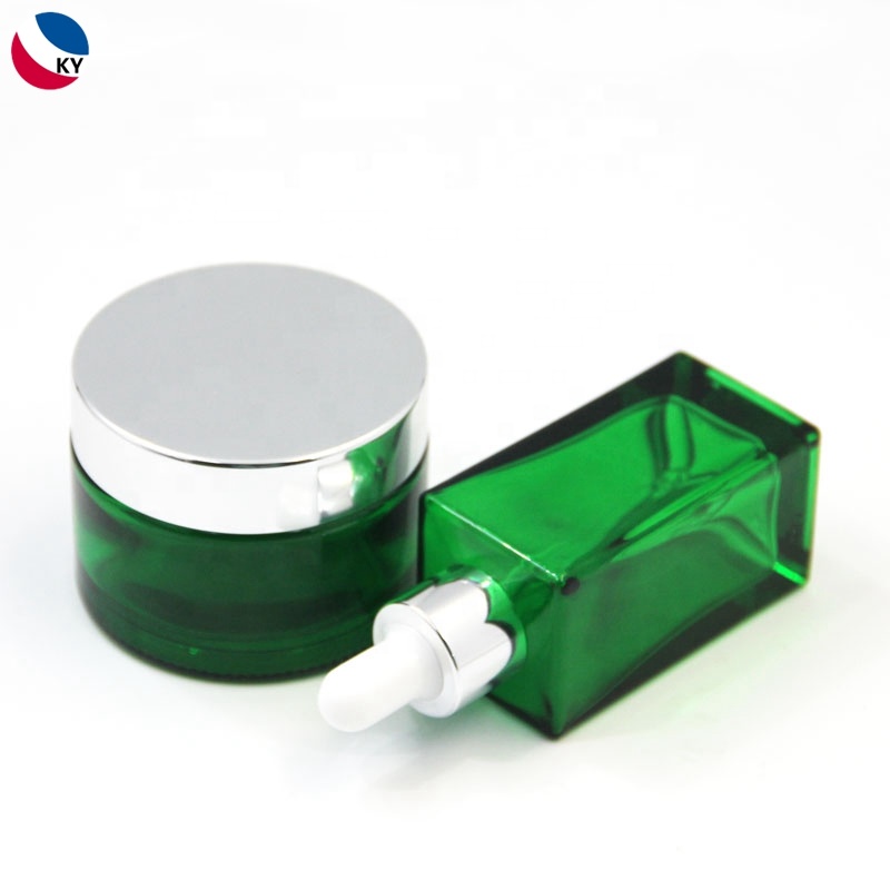 Skincare cream packaging gold coated green frosted glass cosmetic jar
