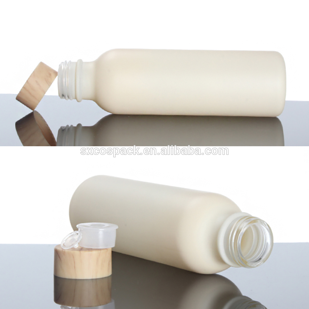 Skincare packaging 50ml 110ml 150ml glass cosmetic bottle, glass bottle pump with white and bamboo grain lid
