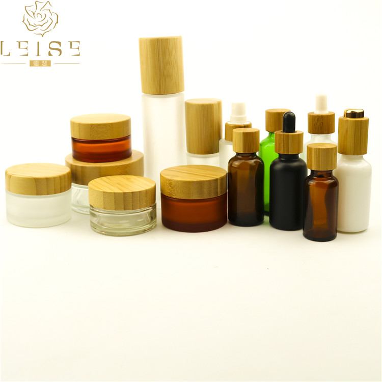 Skincare packaging 50ml 110ml 150ml glass cosmetic bottle, glass bottle pump with white and bamboo lid