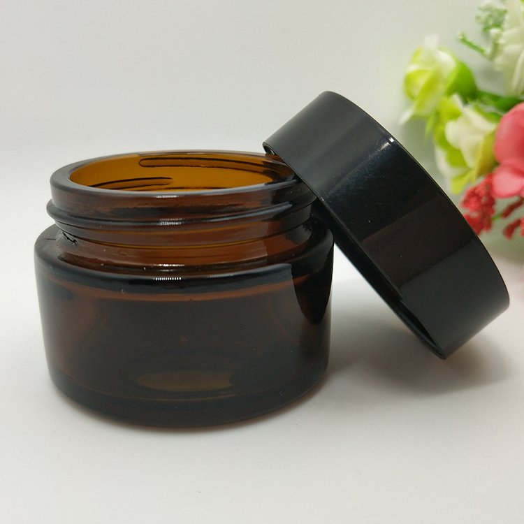 Skincare packing cosmetic cream 100ml 100g shiny black glass jar with golden lid for body scrub