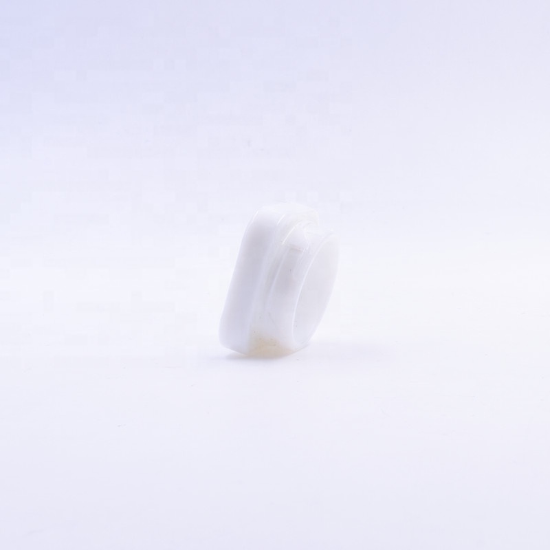 Small 3 ml white round small straight side eye cream cosmetic packing glass jar with black plastic child proof lid.