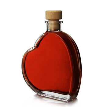 Small MOQ Mini Heart Shaped Glass Whisky Beverage Bottles 250ml Glass Bottle With Cork Top