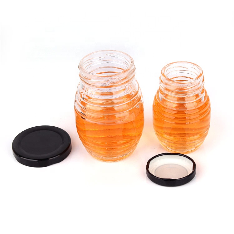 Small empty 70ml clear wide mouth honey jam glass storage jar with metal screw lid