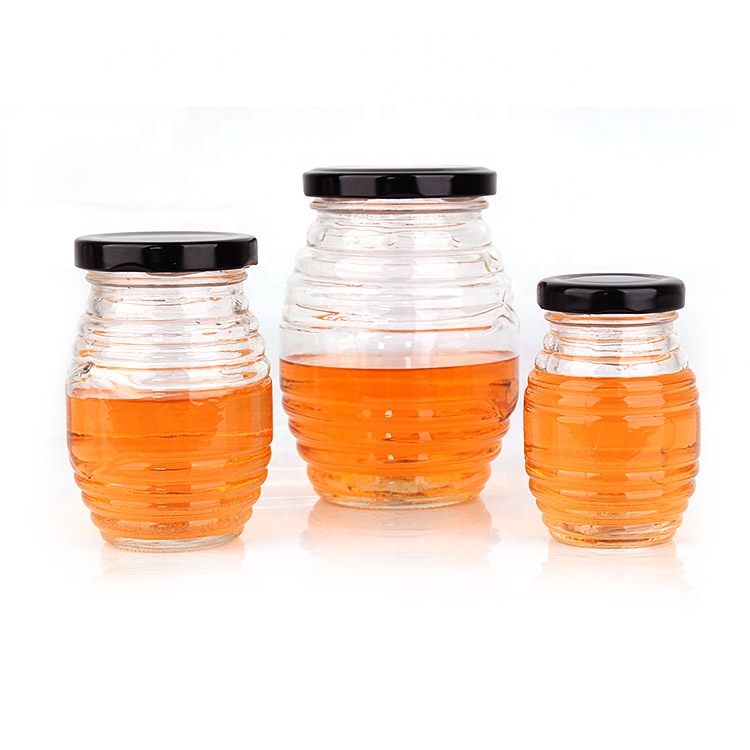Small empty 70ml clear wide mouth honey jam glass storage jar with metal screw lid