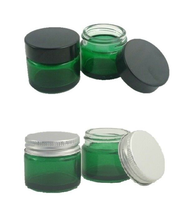 Small frosted green glass cosmetic jars with white lid