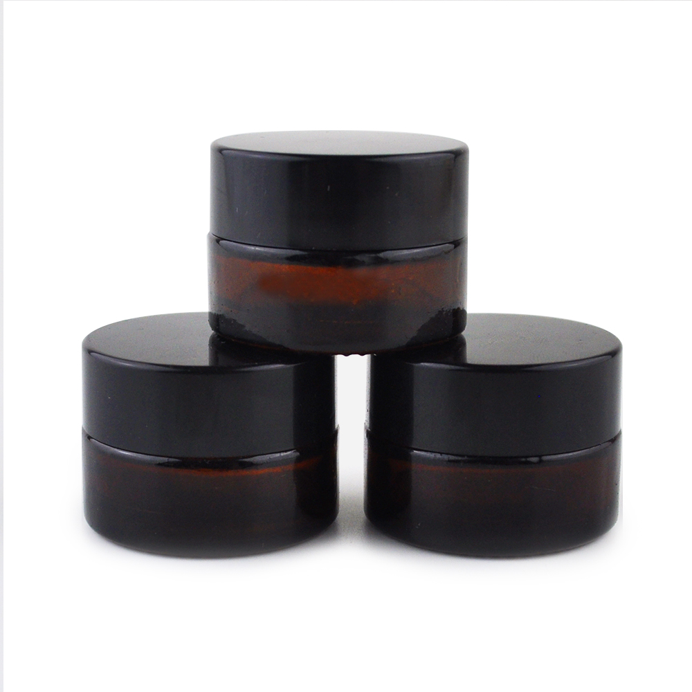 Small round amber frosted 1 oz uv glass jar for cosmetics