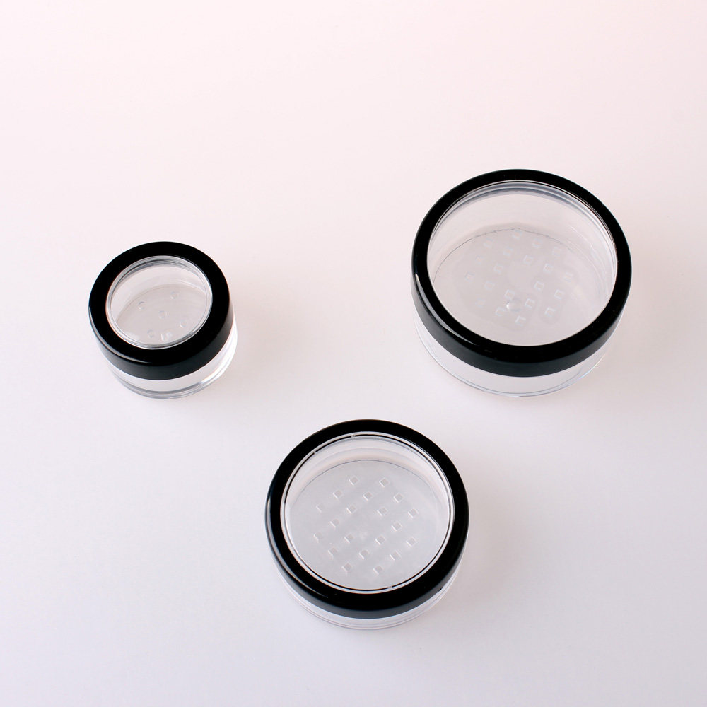 Small round plastic cosmetic containers, loose powder case