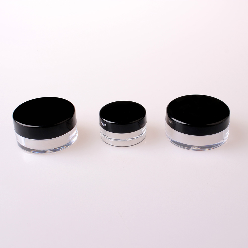 Small round plastic cosmetic containers, loose powder case