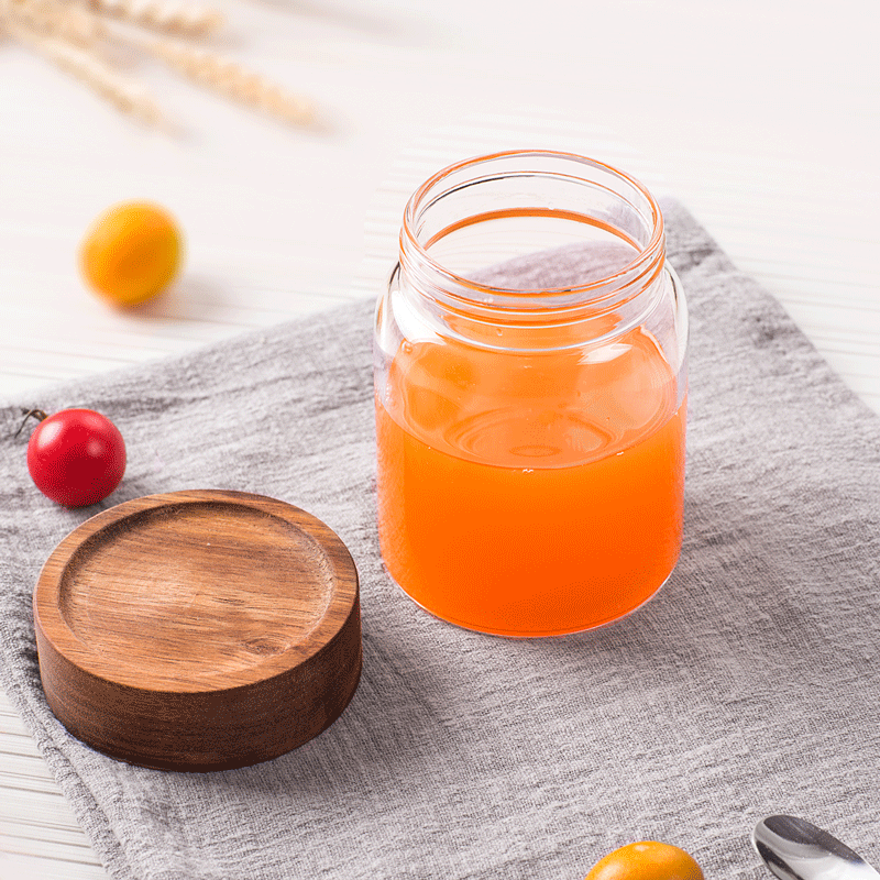 Small transparent jar with spiral mouth with acacia lid