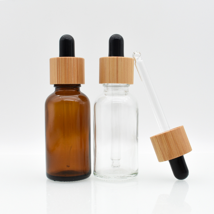 Smok oil 5ml 10ml 15ml 20ml 30ml 50ml 100ml clear amber bamboo lid glass dropper bottles 1oz for cosmetic aromatic massage oil