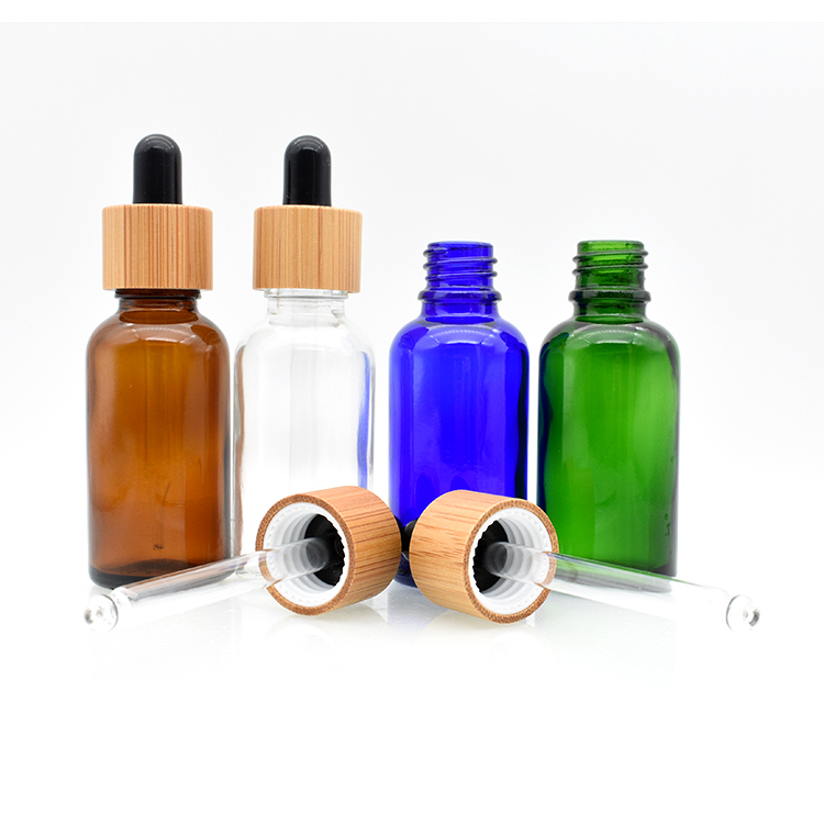 Smok oil 5ml 10ml 15ml 20ml 30ml 50ml 100ml clear amber bamboo lid glass dropper bottles 1oz for cosmetic aromatic massage oil