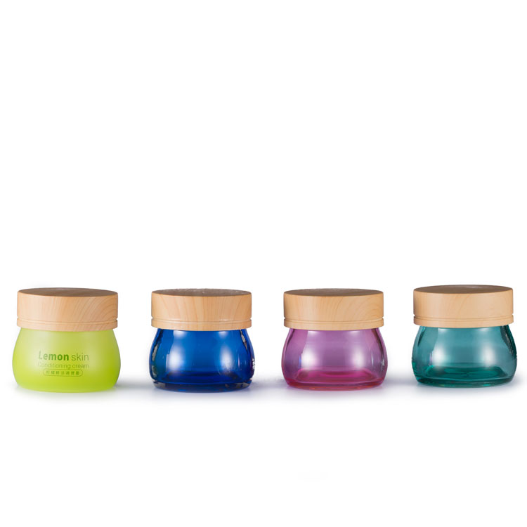 Special design 100 g empty blue cosmetic lotion thick based glass jar container wooden lid for face cream