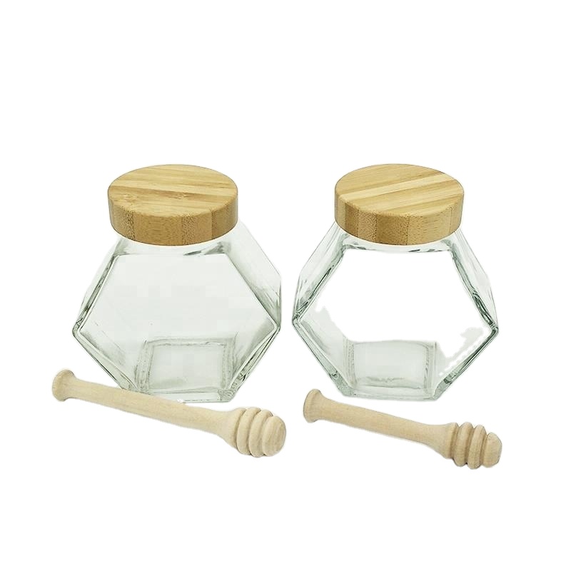 Speed brand 350g hexagon glass jar with wooden lid and wooden dripper for honey