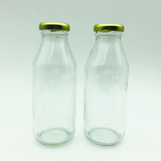 Sri Lanka custom12oz 350ml empty round glass orange juice bottle with metal lid beverage bottle clear glass with metal lid