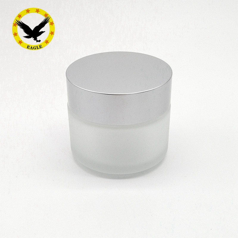 Standard design 1 oz 2 oz cosmetic face cream glass jar with matt silver lid