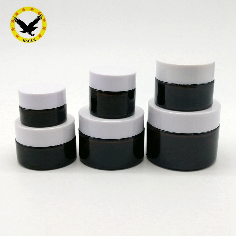 Standard design 2 OZ Amber Glass Jar Straight Sided with Plastic Lined Cap