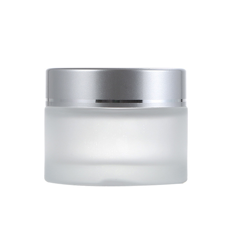 Stock 1oz 2oz 3oz cylinder cosmetic skin care cream empty glass jar silver lid