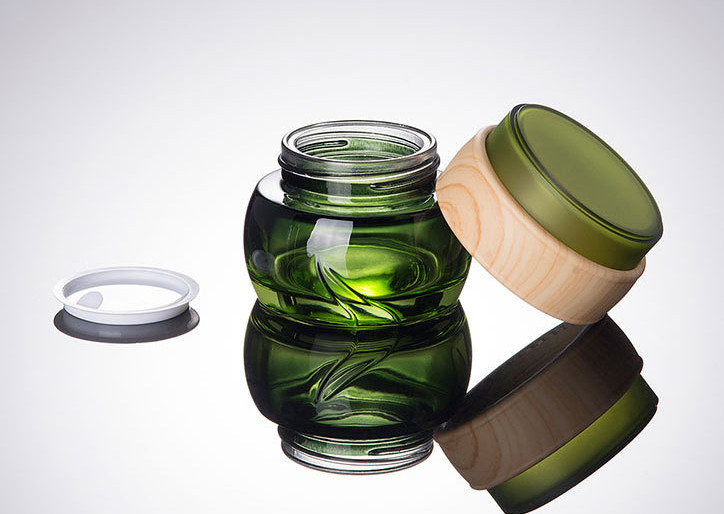 Stock Product luxury Empty cylinder 50g Green Glass Face Hand Cream Jar With Bamboo Lid Cosmetic Packaging Container
