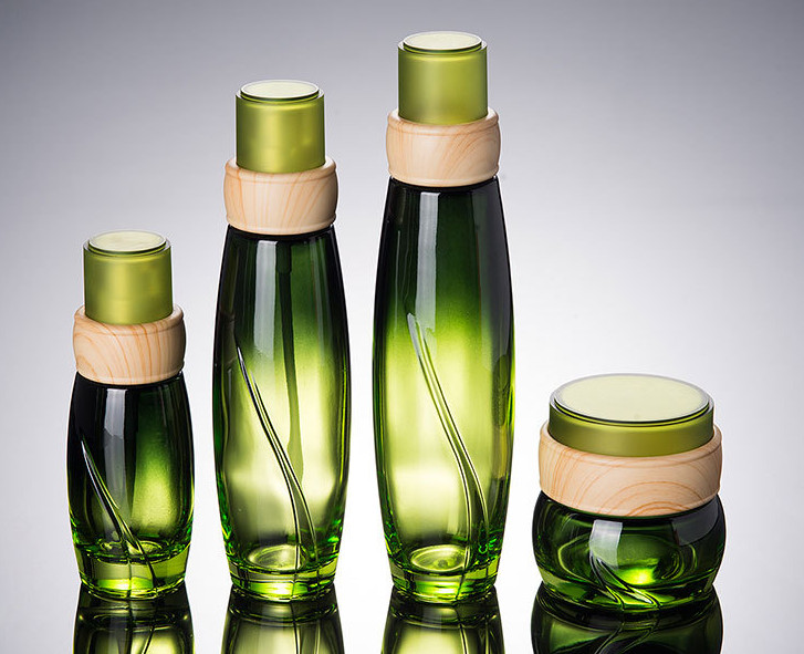 Stock Product luxury Empty cylinder 50g Green Glass Face Hand Cream Jar With Bamboo Lid Cosmetic Packaging Container