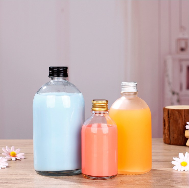 Stock Various Sizes Boston Round Cold Brew/Kombucha Beverage Glass Bottle with Screw Lid