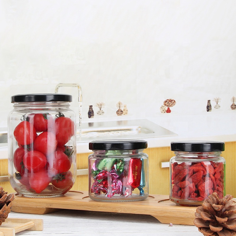 Stock food packaging glass jar round shaped glass jar with metal lid for honey
