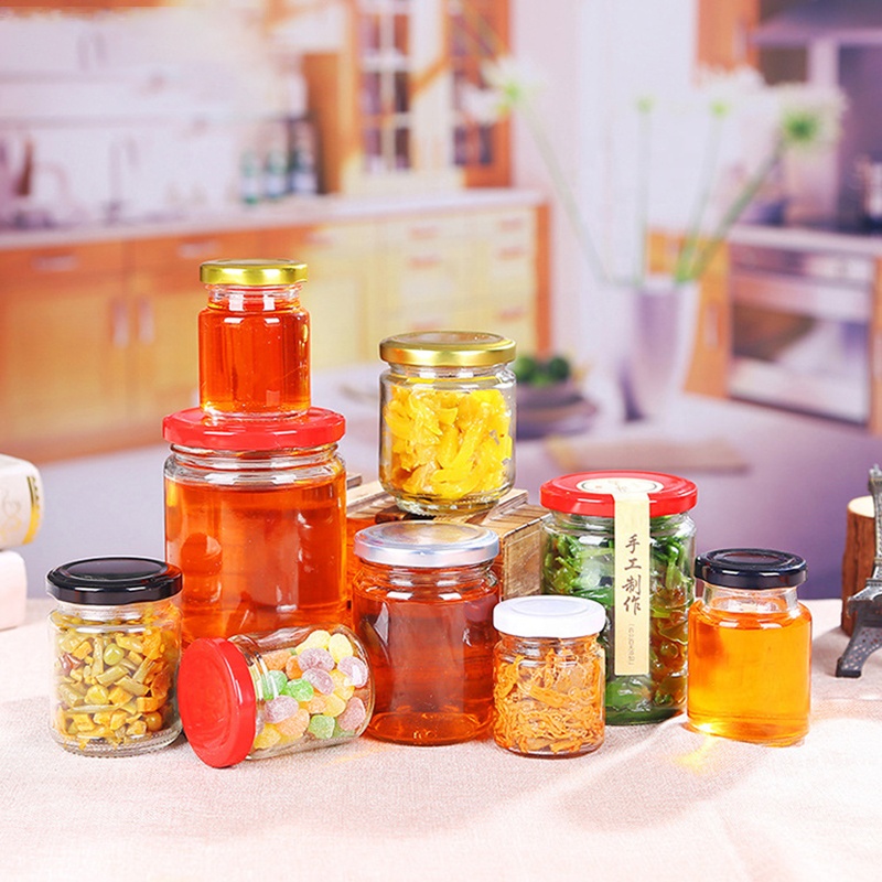 Stock food packaging glass jar round shaped glass jar with metal lid for honey