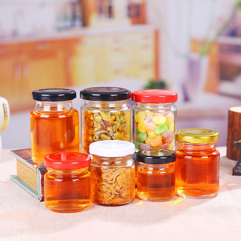 Stock food packaging glass jar round shaped glass jar with metal lid for honey