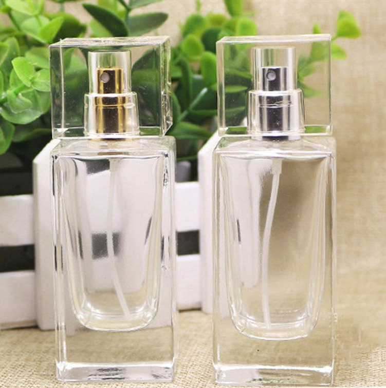 Stock small empty 30ml 50ml 100ml square perfume bottle spray pump perfume spray bottle glass with flower cap glass stopper