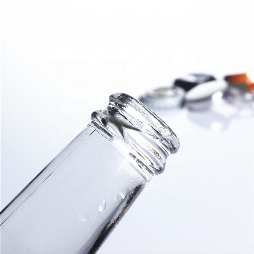 Stocked 330ml clear transparent empty carbonated beverage soft drinking cocktail liquor breezer beer glass bottle with lid